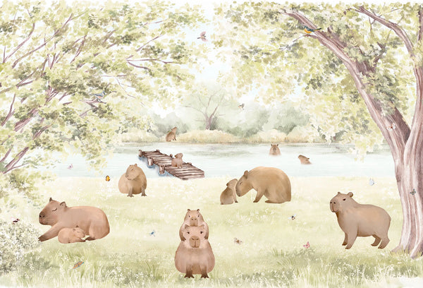 Papel tapiz con ilustración en acuarela de familia de capibaras en pradera con árboles y lago para cuarto infantil.