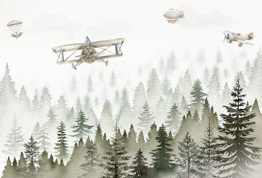 Papel tapiz mural infantil con bosque de pinos en acuarela verde y aviones vintage en vuelo