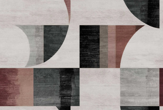 Papel tapiz con diseño geométrico abstracto de arcos y bloques en tonos gris, grafito y terracota suave.