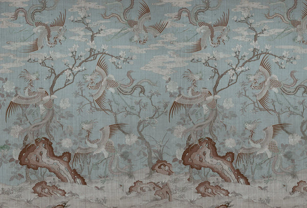 Papel tapiz de estilo chinoiserie con aves fénix y flores sobre fondo cian texturizado.