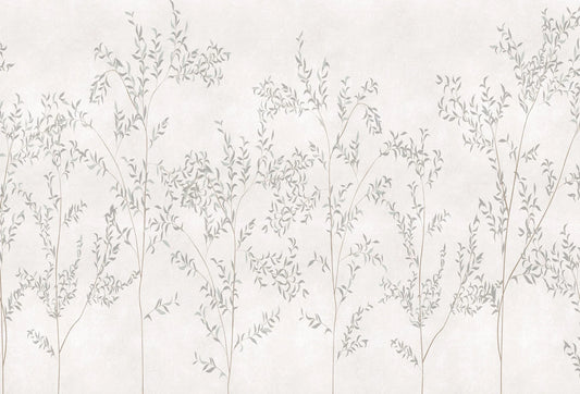 Papel tapiz mural con delicadas ramas y hojas botánicas en tonos gris suave sobre fondo claro.