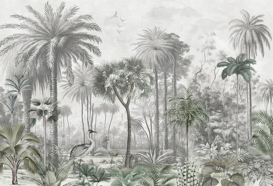 Papel tapiz mural estilo grabado vintage con palmeras, aves zancudas y vegetación en tonos grises y verdes suaves.