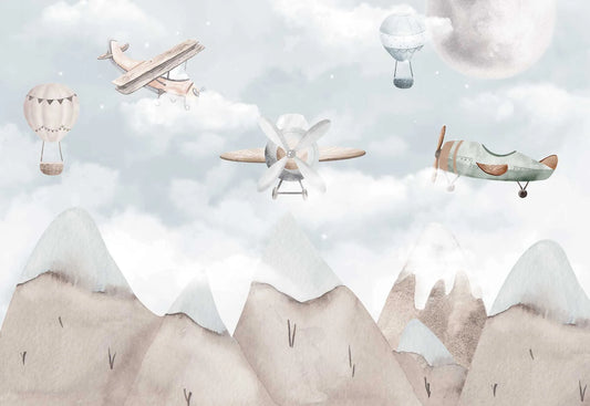 Papel tapiz mural infantil con avionetas vintage, globos aerostáticos y montañas nevadas en tonos beige y gris acuarela.
