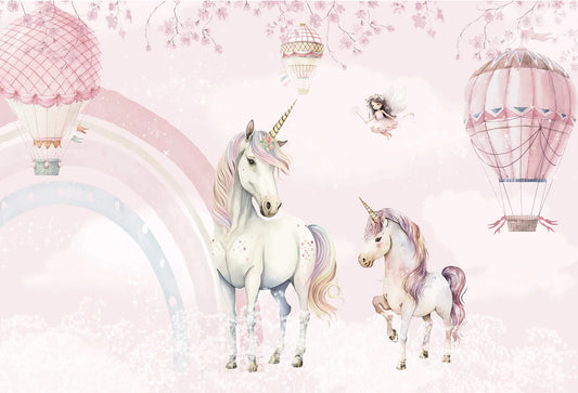 Papel tapiz mural infantil con tiernos unicornios, globos aerostáticos y arcoíris en tonos rosa pastel